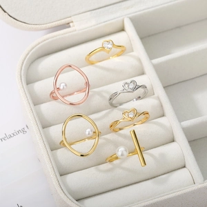 Set of 18k gold plated pearl and heart zirconia adjustable open rings in a white box