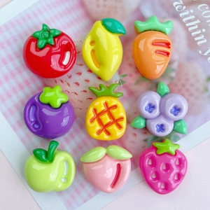 Nine colorful resin fruit charms including strawberry and peach for DIY phone case decor