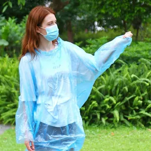 Portable light blue disposable hooded raincoat for adults made of thickened PE plastic