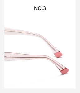 Close-up of transparent pink eyeglass temples with reinforced metal core construction
