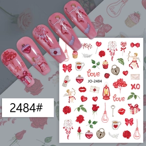 Detail of Valentine nail stickers featuring red roses, cupids and love hearts on nails