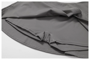 Close-up of high-waisted dark grey tennis skort with built-in security liner