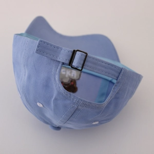 Light blue cotton baseball cap for kids featuring adjustable metal buckle and bear patterns