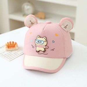 Detail of baby baseball cap with pink 3D ears and cute cartoon bear skating patch
