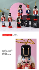 Detail showing hand-painted patterns and gold lanyard on wooden nutcracker soldier