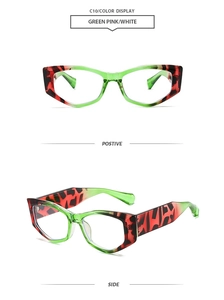 Detail view of cat eye sunglasses in green pink leopard pattern with thick temples