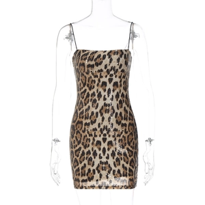 Close-up of sparkling leopard print sequins on a sexy mini bodycon camisole dress
