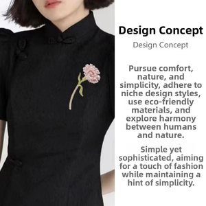 Pink floral carnation brooch with green leaves on a black traditional cheongsam dress