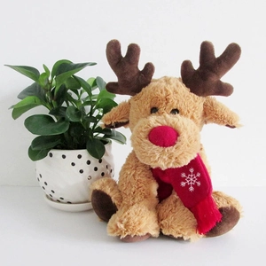 Brown plush reindeer toy with a red snowflake scarf against a clean white background
