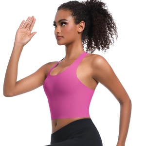 Vue latérale du soutien-gorge de sport sans couture rose avec dos croisé élastique