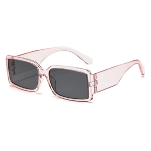 Retro rectangle pink translucent sunglasses with wide temples and dark grey lenses for women