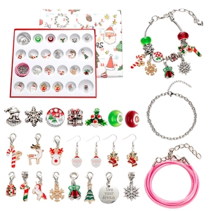 Christmas 24-day countdown calendar jewelry set with silver bracelets and holiday charms