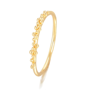 Detailed view of adjustable golden ring featuring clustered metallic beads in bubble style