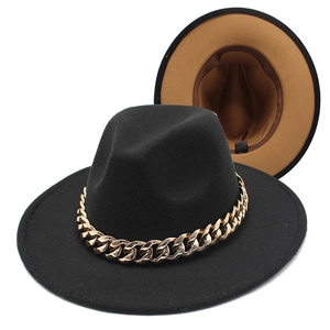 Detail of fedora hat interior with khaki lining, sweatband and gold acrylic chain