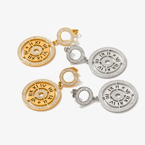 Compass earrings with Roman numerals and sparkling crystals in gold and silver