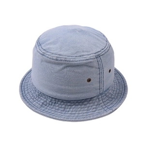Detail of light blue denim bucket hat with metal eyelets and reinforced brim stitching