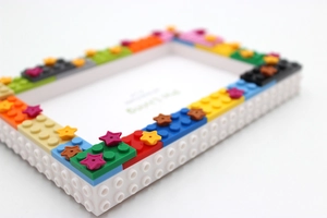 Detail of colorful star blocks on the white DIY building block photo frame corner
