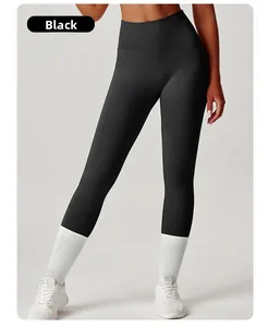 Detail of high waisted black yoga pants with a convenient side pocket for workouts