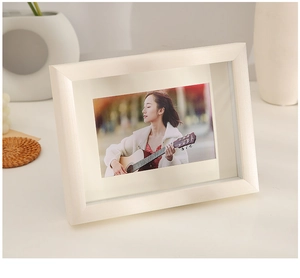 Macro detail of white minimalist wooden picture frame with modern matte texture