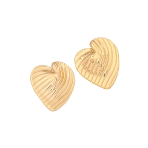 Minimalist gold heart-shaped earrings with textured surface on a white background