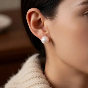 French minimalist round pearl stud earrings in silver for women's elegant daily wear