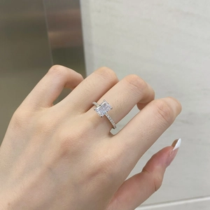 Close-up of S925 sterling silver butterfly ring with rectangular gemstone and diamonds
