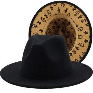 Classic black wool fedora hat with a vintage patterned lining and wide brim style