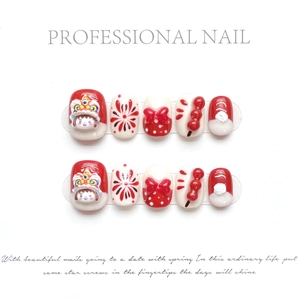 Handmade Chinese New Year press-on nails featuring 3D lion dance and tanghulu designs