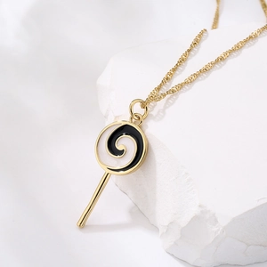 Lollipop pendant necklace with black and white enamel in 18K gold plated finish