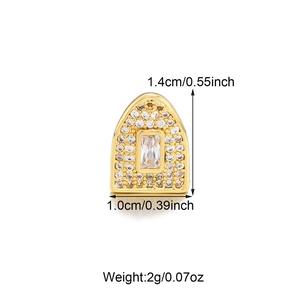 Detail view of gold hip-hop grillz with paved zircons and precise size measurements