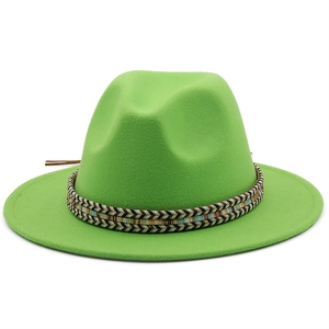 Detail of neon green wool fedora hat featuring a colorful ethnic style braided band
