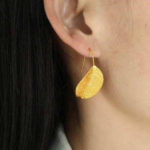 French vintage style golden leaf earrings made of high-quality titanium steel for women