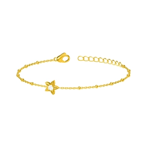 Elegant gold stainless steel bead bracelet featuring a flower pendant and white zircon
