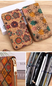 Detail of bohemian cork wallet showing multi-card slots and smooth gold zipper hardware