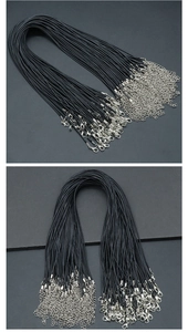 Detail of black wax cord necklace with silver lobster clasp and extension chain