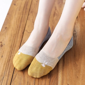 Breathable cotton invisible socks with cartoon rabbit embroidery on wooden floor
