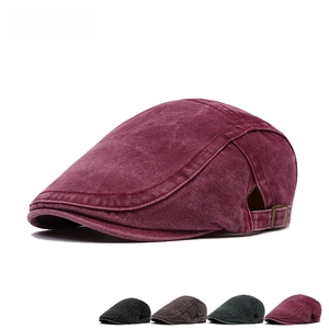 Vintage washed cotton newsboy cap in burgundy with adjustable metal buckle on side