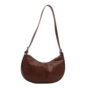 Retro brown half-moon underarm bag in glossy leather finish with adjustable strap