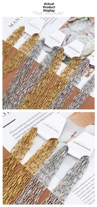 Detail of stainless steel paperclip chains in gold and silver for DIY jewelry