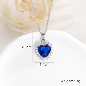 Detail view of heart pendant necklace with dimensions 2.3cm by 1.4cm and 2.3g weight