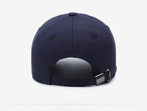 Back view of navy blue baseball cap showing adjustable metal buckle and stitching