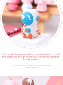 Detail of cute astronaut pencil sharpener figurine used as a desk ornament for kids