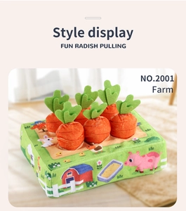 Detail of plush tissue box toy featuring farm animals and pull-out carrots for babies