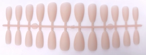 Detail view of matte nude pink almond press-on nails on a plastic factory strip