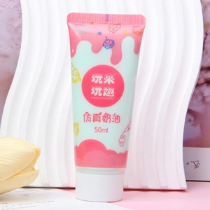 Close-up of 50ml light green simulation cream glue for DIY craft phone cases