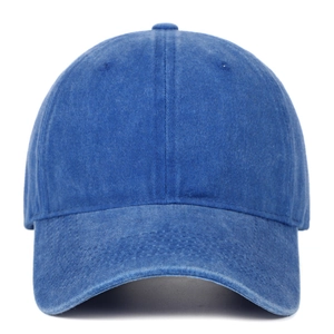 Close-up of vintage washed blue cotton baseball cap showing detailed fabric texture and seams