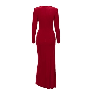 Detail view of the back of an elegant long-sleeve velvet evening dress with a slim-fit cut