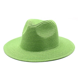 Classic lime green straw Panama hat with breathable woven texture for summer sun protection