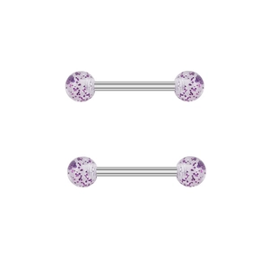 Detailed macro view of heart-shaped barbells with purple sequin spheres for body piercing