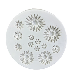 White circular silicone mold with various sunflower shapes for DIY cake and craft projects